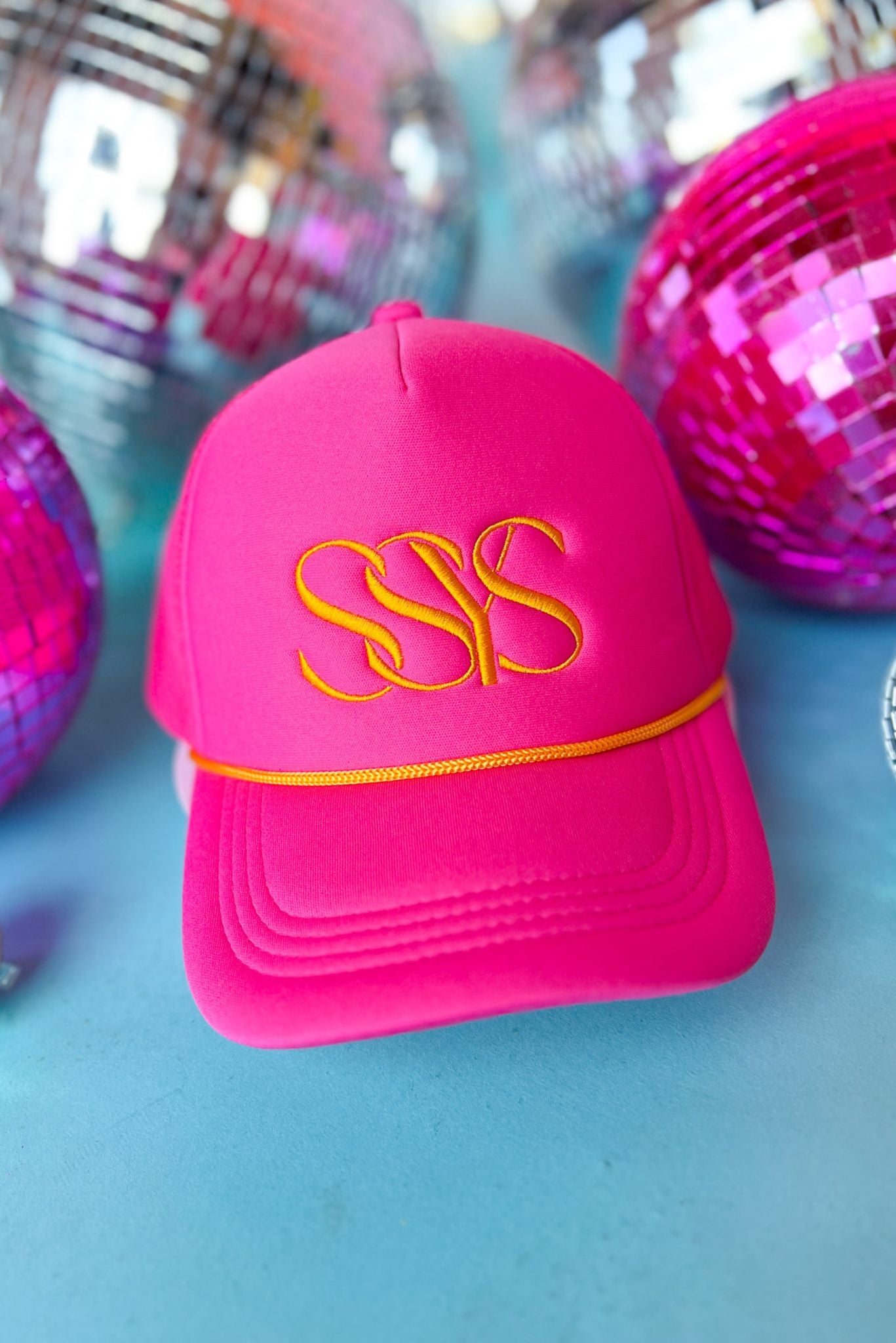 SSYS Hot Pink And Orange Trucker Hat, accessory, hat, trucker hat, ssys logo hat, hot pink and orange accessory, hot pink and orange hat, hot pink and orange trucker hat, hot pink and orange ssys logo hat, must have accessory, must have hat, elevated accessory, elevated hat, elevated style, elevated styling, Shop Style Your Senses by Mallory Fitzsimmons, SSYS by Mallory Fitzsimmons