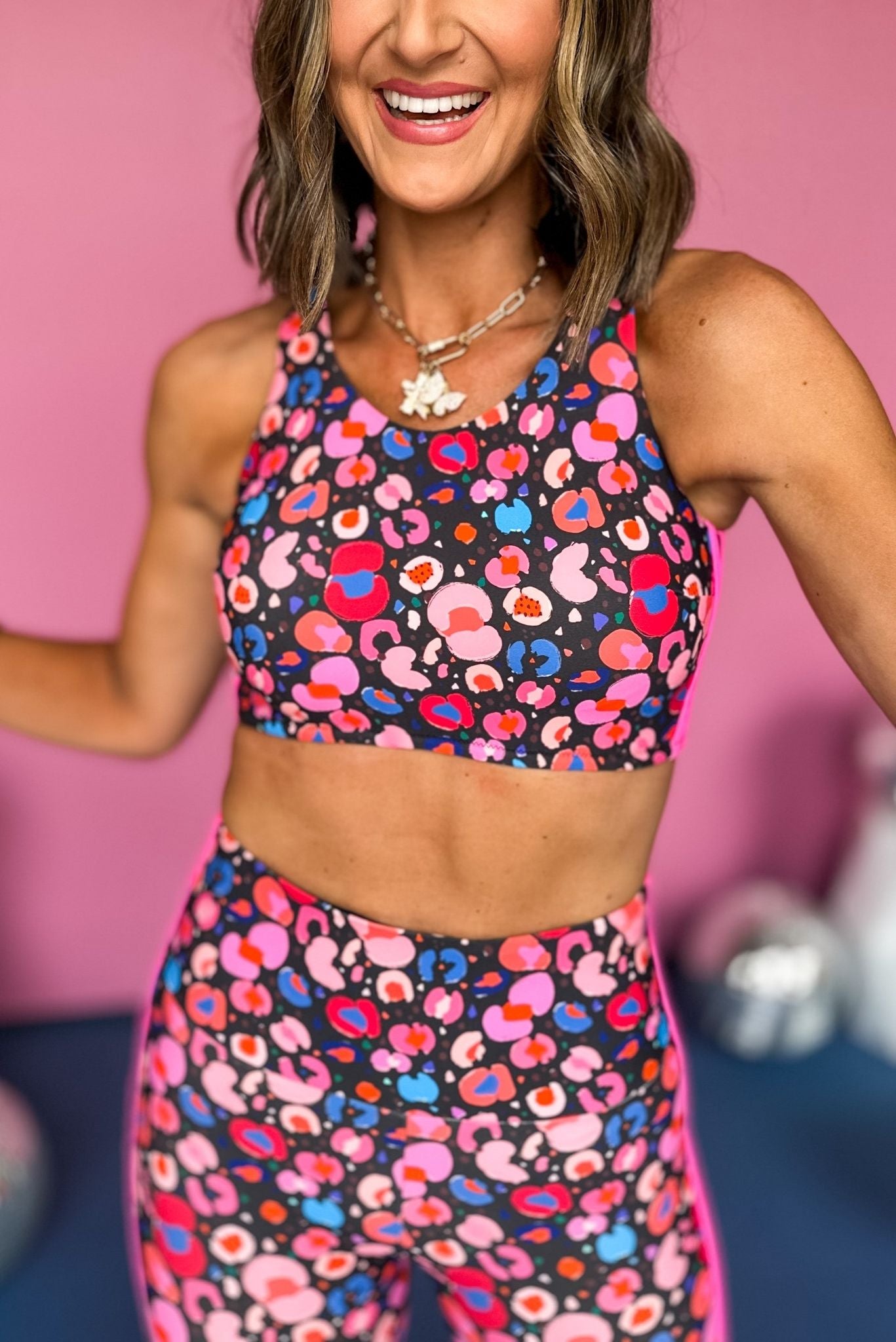 SSYS Abstract Animal Print Sports Bra With Pink Stripes, must have sports bra, must have athleisure, elevated style, elevated athleisure, mom style, active style, active wear, fall athleisure, fall style, comfortable style, elevated comfort, shop style your senses by mallory fitzsimmons