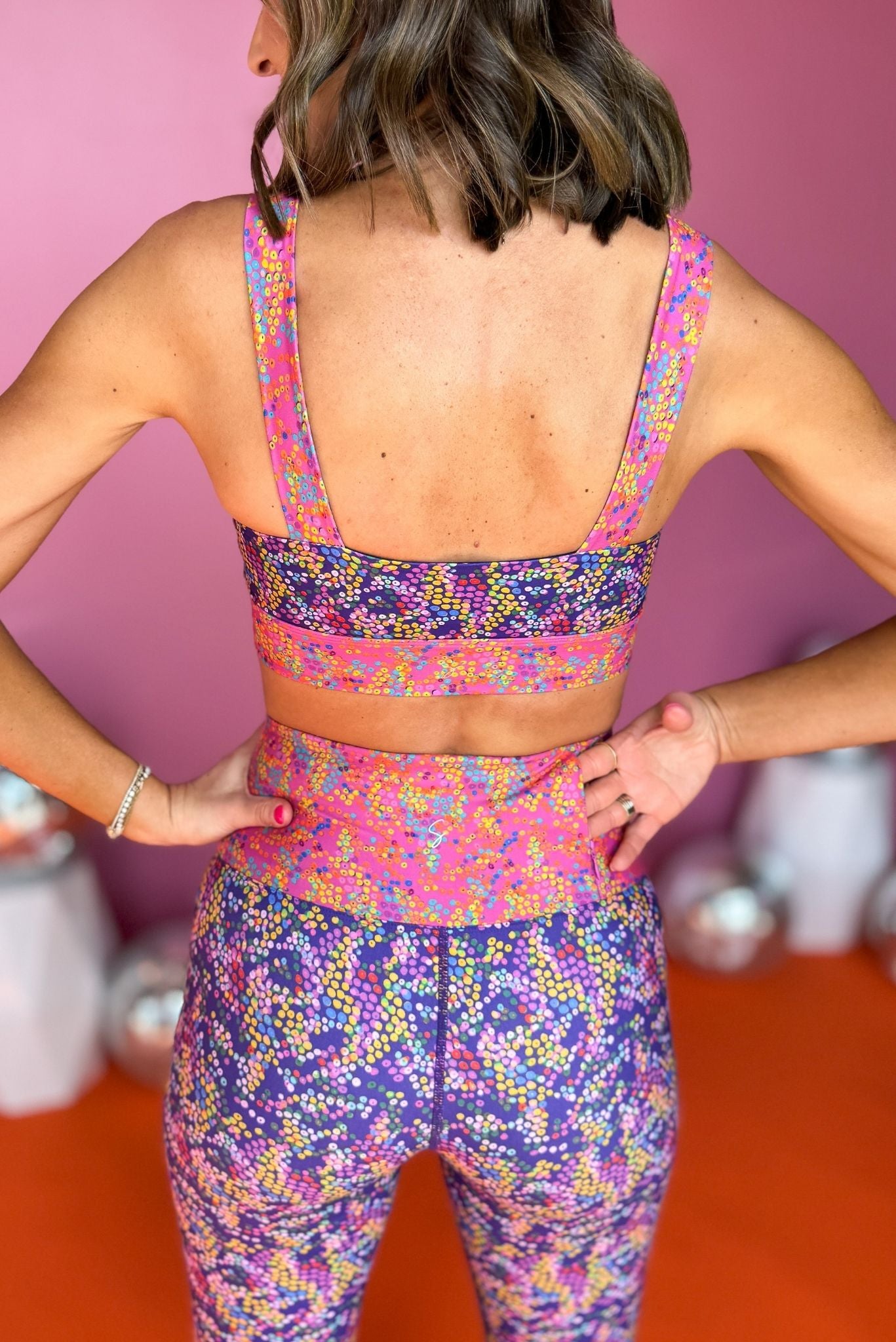 SSYS Purple Pink Mix Confetti Thick Strap Compression Sports Bra,  ssys the label, athleisure, elevated athleisure, must have sports bra, athletic sports bra printed sports bra, athletic style, mom style, shop style your senses by mallory fitzsimmons, ssys by mallory fitzsimmons