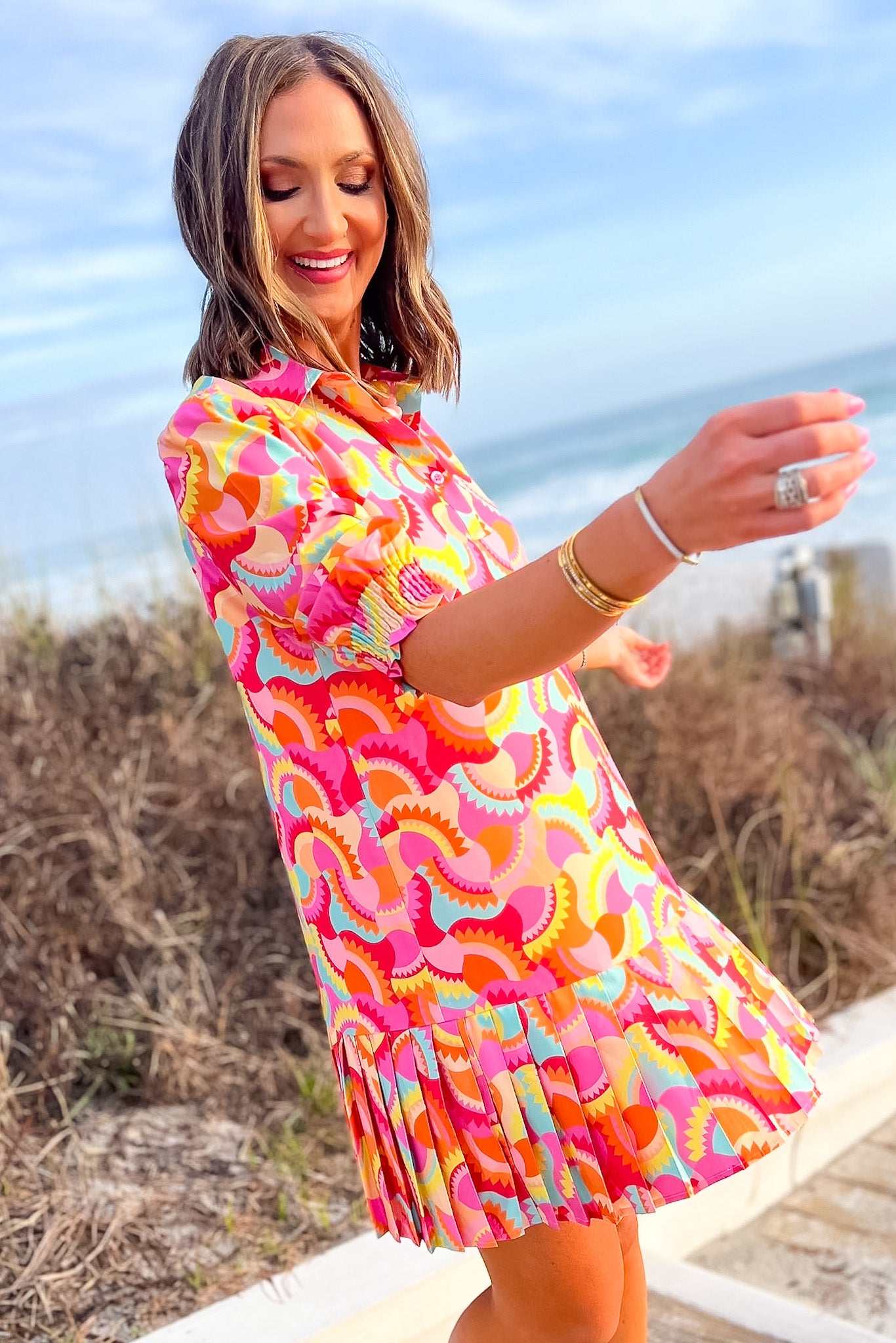 SSYS Phoebe Smocked Long Sleeve Pleated Bottom Dress In Bright Sunflare