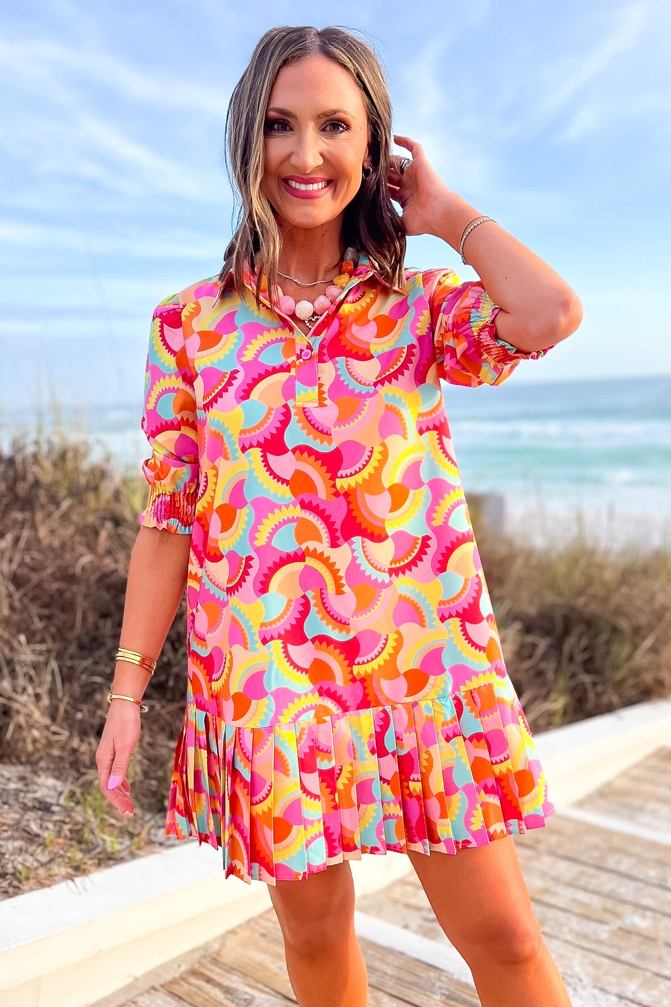 smocked long sleeve dress SSYS Phoebe Smocked Long Sleeve Pleated Bottom Dress In Bright Sunflare