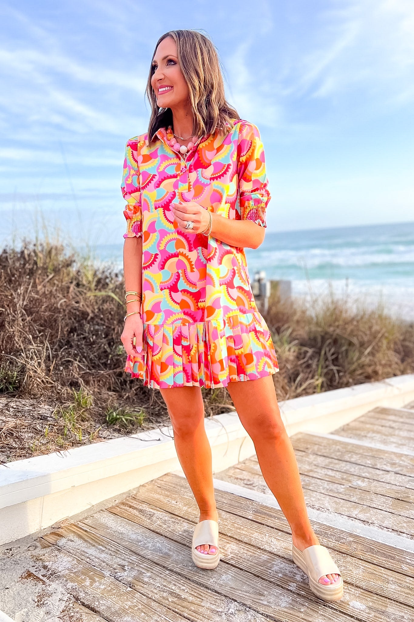 SSYS Phoebe Smocked Long Sleeve Pleated Bottom Dress In Bright Sunflare