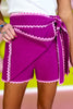 SSYS Skylar Ric Rac Trim Linen Wrap Skort In Orchid, tie waist, built in shorts, vibrant, spring, cute, feminine, exclusive design, ssys by mallory fitzsimmons