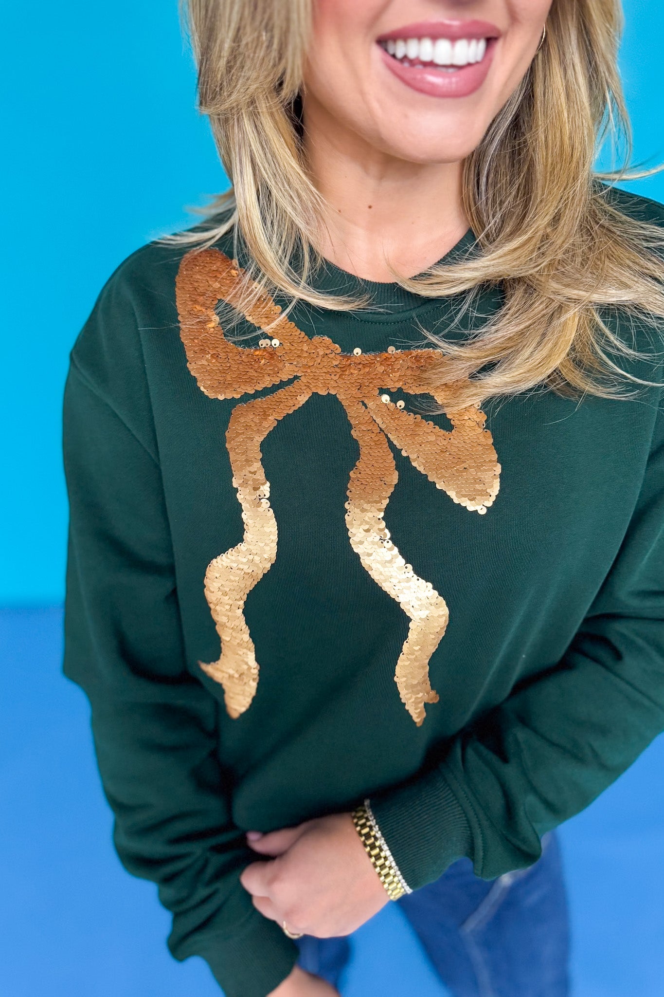 SSYS Dorothy Cropped Bow Sequin Sweatshirt In Hunter