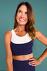 SSYS Curved Contrast Signature Sports Bra in Navy and White
