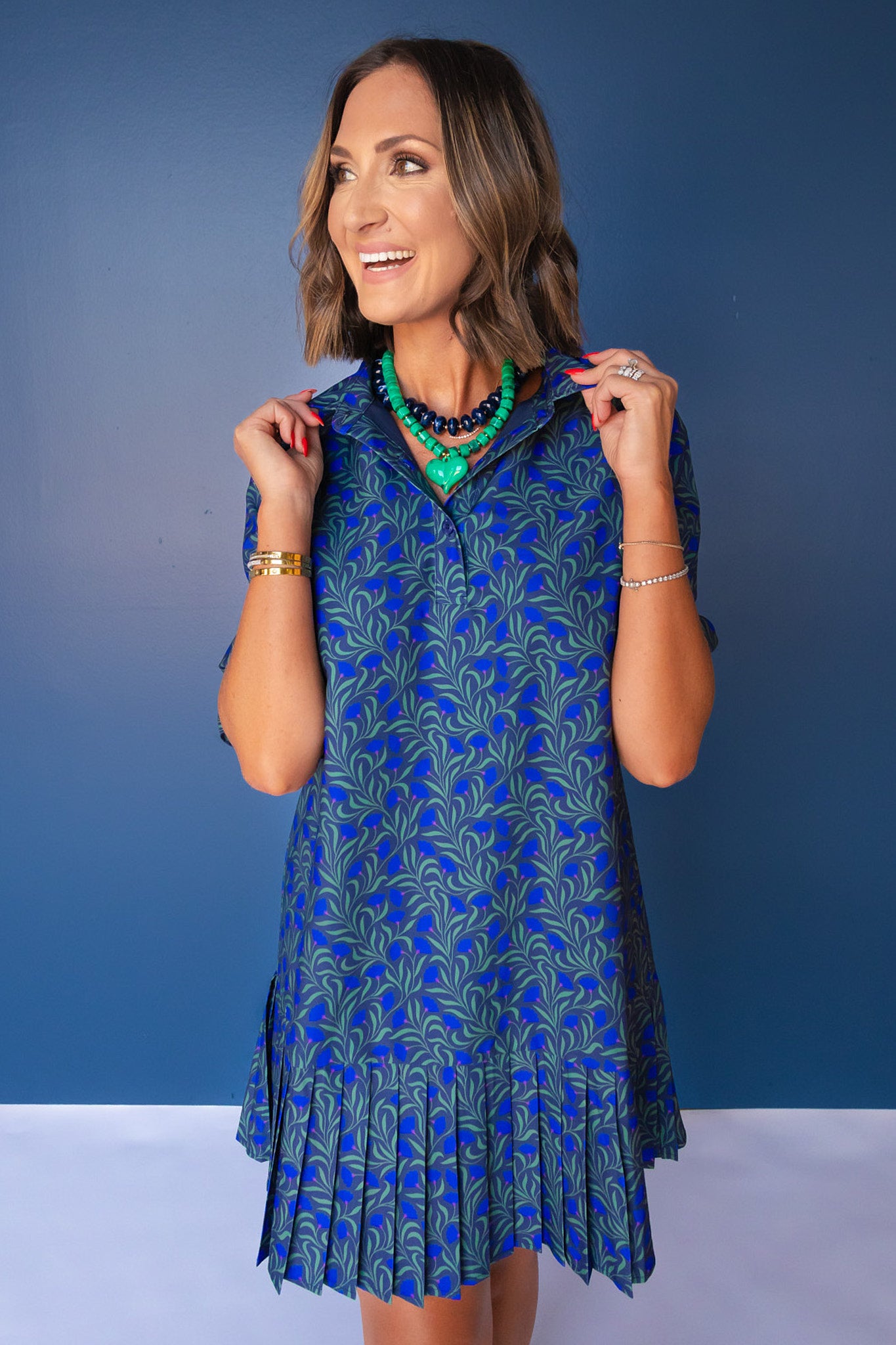 SSYS Phoebe Smocked Long Sleeve Pleated Bottom Dress In Navy Palm