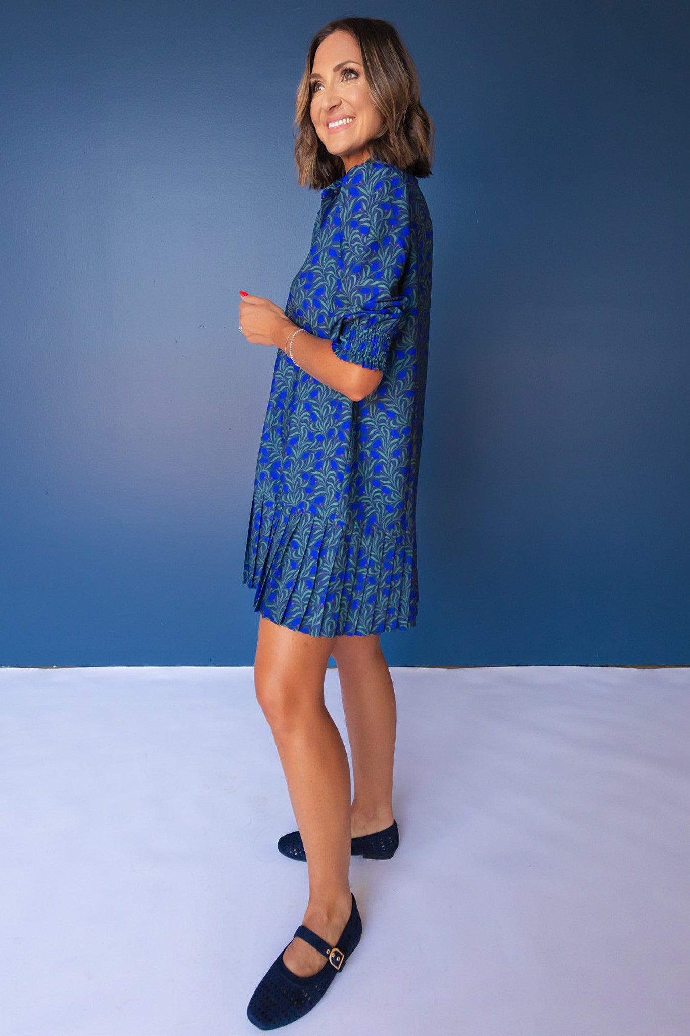 SSYS Phoebe Smocked Long Sleeve Pleated Bottom Dress In Navy Palm