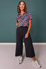 SSYS Scuba Short Sleeve Zip Up Top In Bright Petal Party