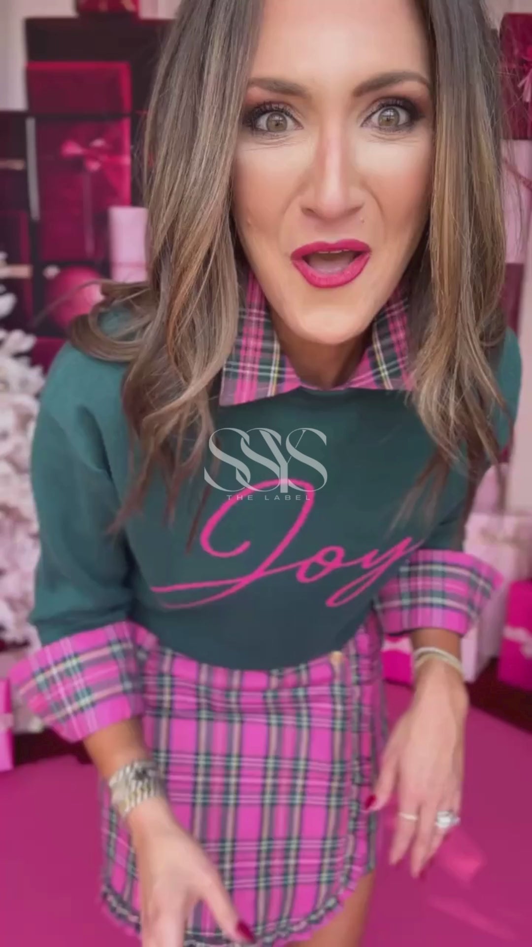 Get wrapped up in festive flair with the Melody Tartan Plaid Skort, a holiday-ready essential that blends preppy charm with playful edge. Featuring a pink and green holiday plaid, faux wrap-front detail, and built-in shorts for comfort and coverage, it’s the perfect piece for Christmas parties, family photos, or festive weekends out.