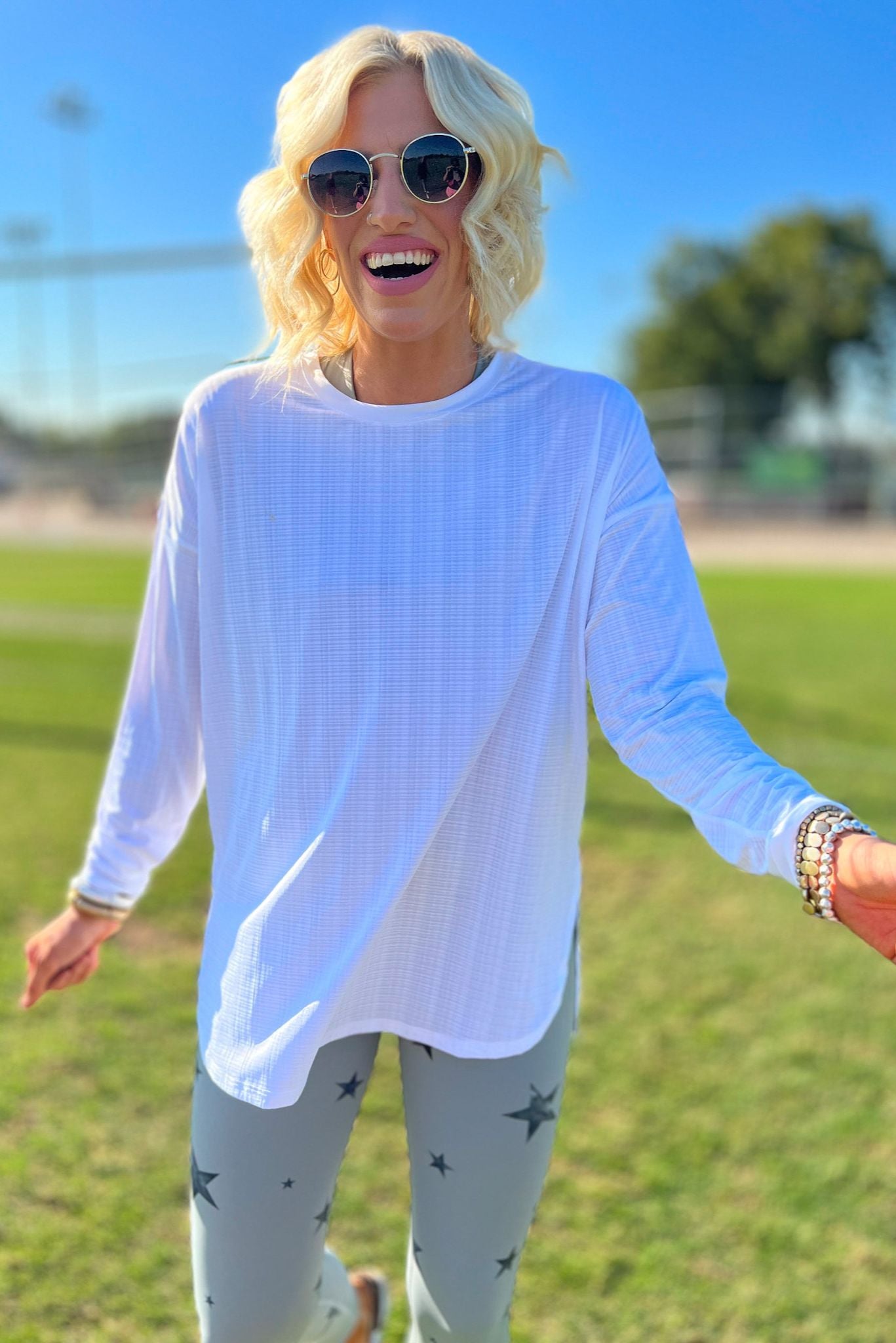 White Textured Side Slits Long Sleeve Top, long sleeve, white long sleeve, work out outfit, lounge wear, athleisure, leggings, matching set, shop style your senses by mallory fitzsimmons