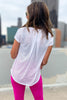 white sheer striped athleisure top with back panel, June athleisure collection, comfy style, gym fashion, workout wear, shop style your senses by mallory fitzsimmons