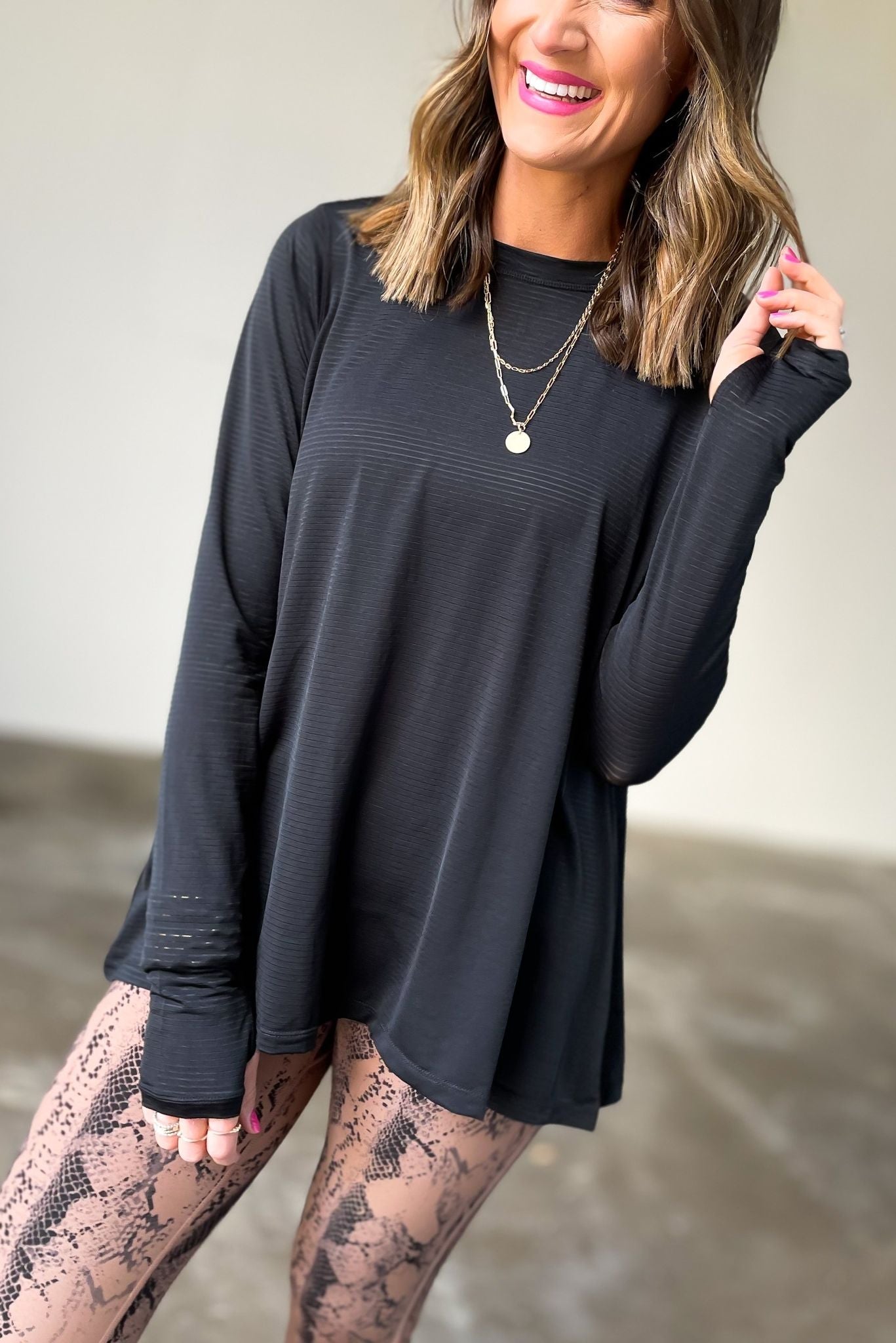 black long sleeve ribbed top with cut out back, affordable athleisure, fitness fashion, shop style your senses by mallory fitzsimmons