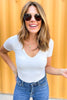 ivory double layered short sleeve v neck top, medium wash flare denim, closet staples, layering pieces, date night options, shop style your senses by mallory fitzsimmons