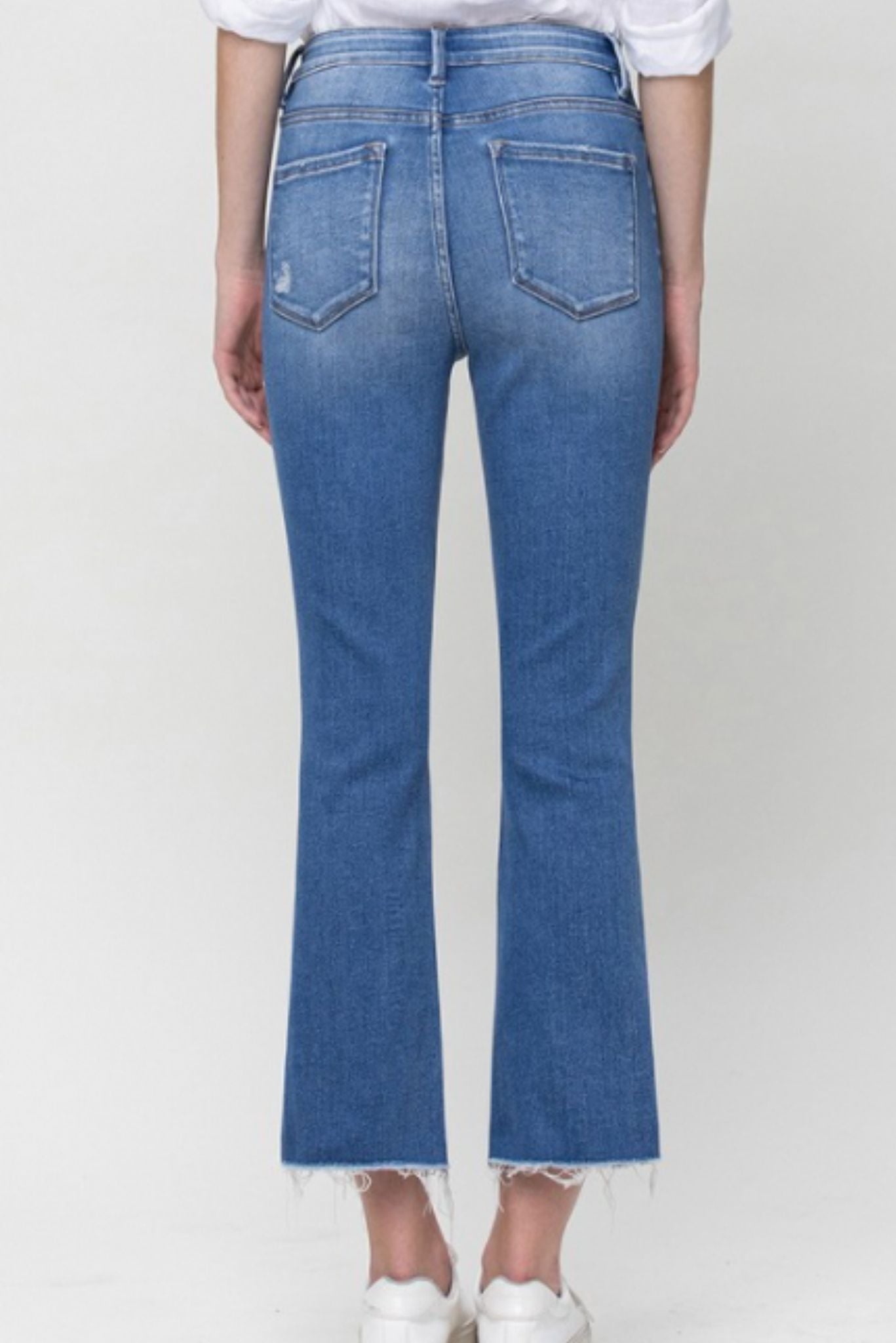 Medium Wash High Rise Cropped Kick Flare With Raw Hem Jeans