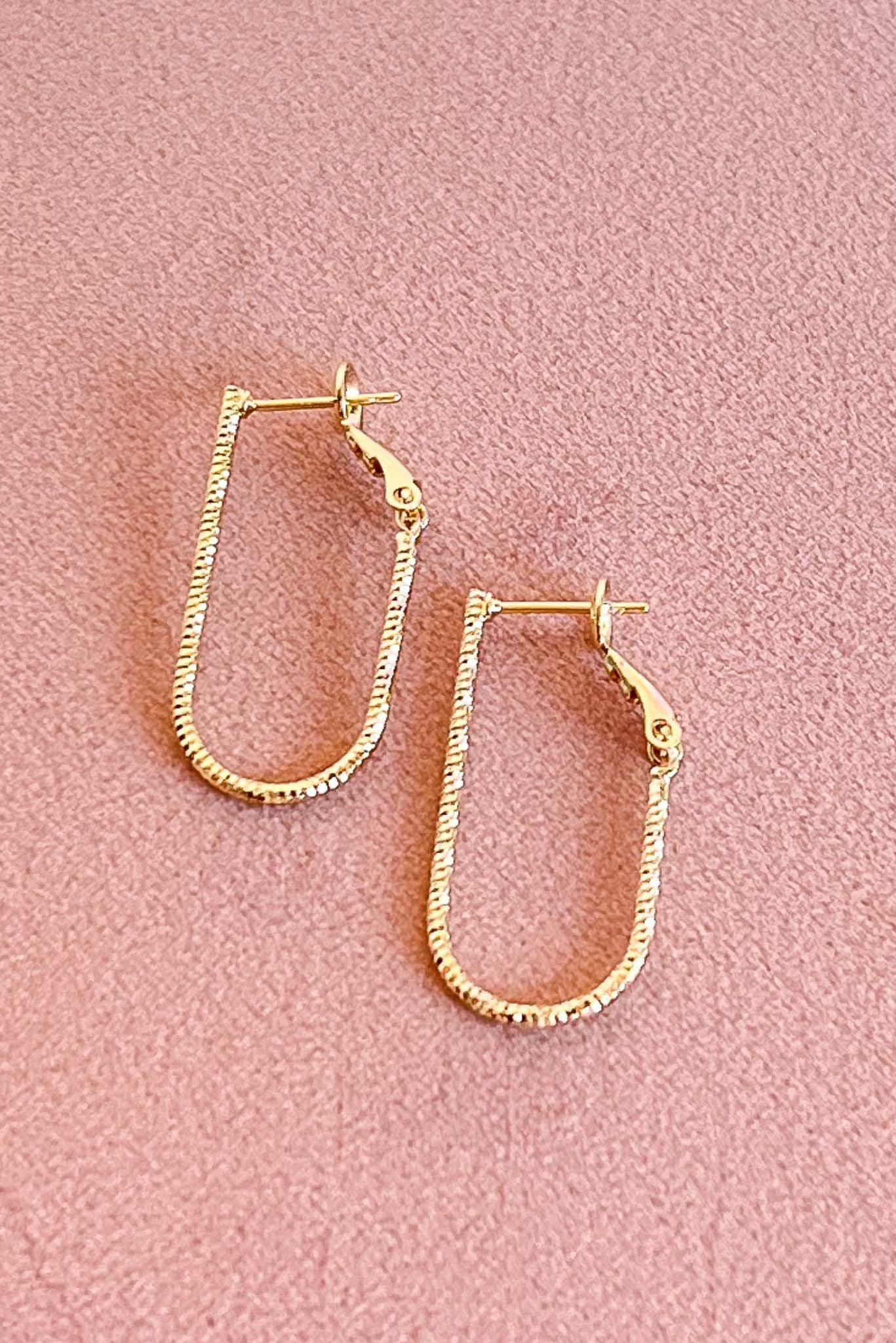 Gold Textured Metal Oval Hoop Earrings